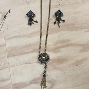 Set of clip earrings and necklace